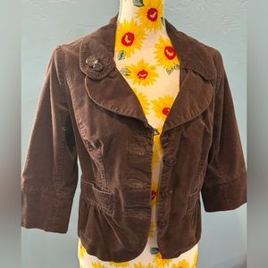 Cute brown velvet jacket.